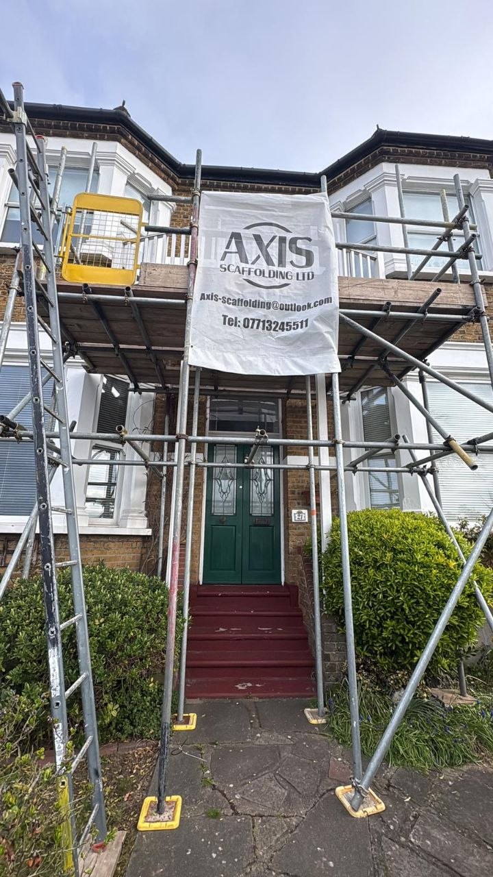 Scaffolding with debris netting for facade repair works