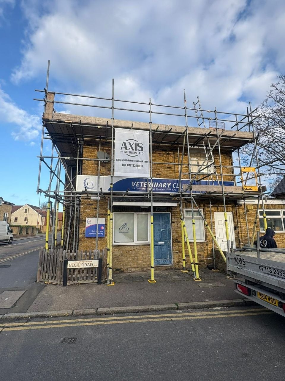 Scaffold tower setup on a heritage brick building renovation